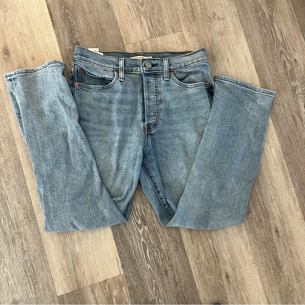 Levis Denim Jeans Size 31 with distressed knees high rise button fly light wash